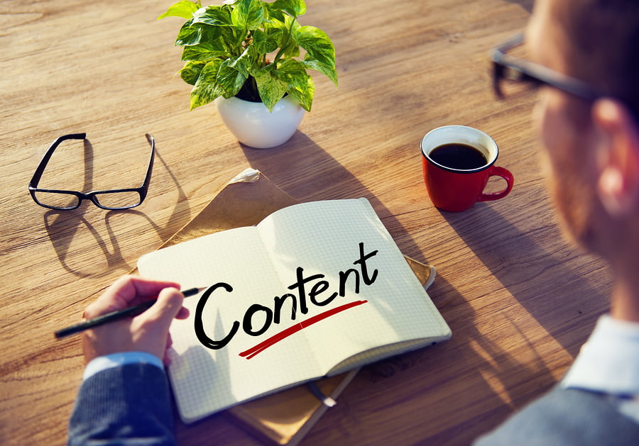 Businessman Writing the Word Content